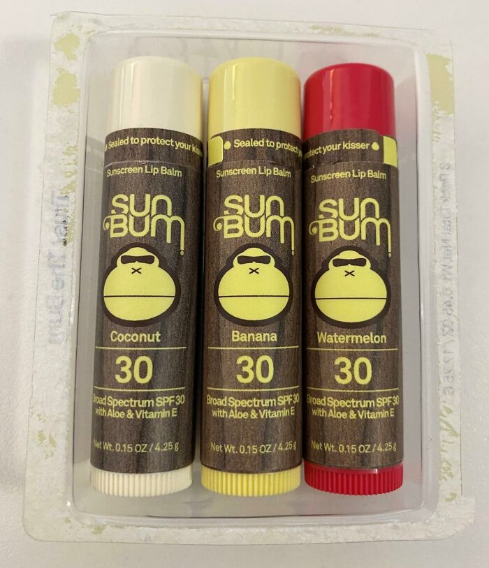 Three Sun B*m sunscreen lip balms in coconut, banana, and watermelon flavors for warm weather protection with SPF 30.