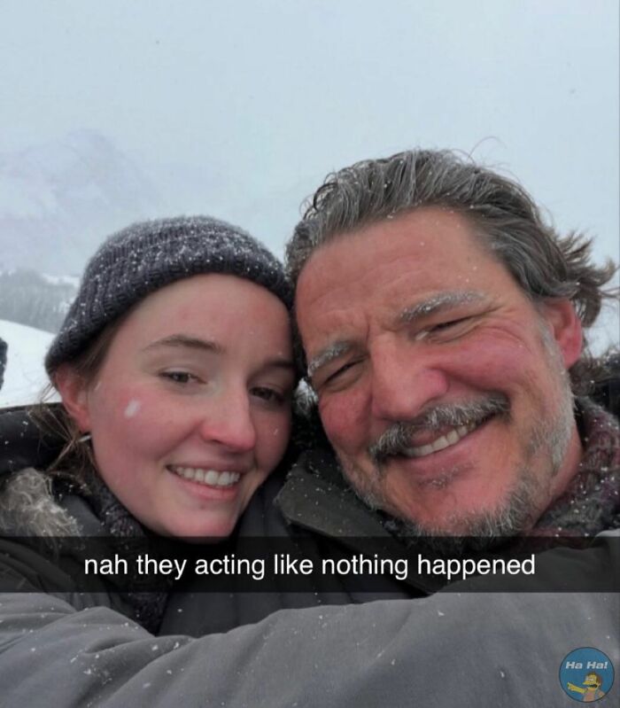 A smiling man and woman in winter clothes with snow on their faces and a mocking posts jokes memes caption overlay.