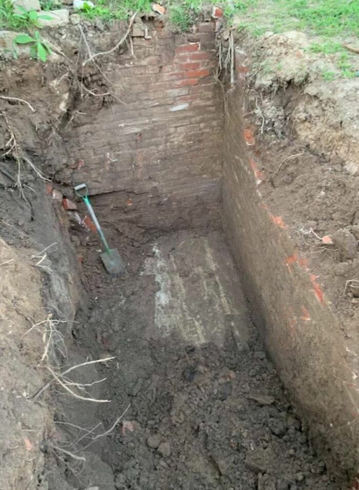 Excavated hidden underground brick structure revealing strange things found in homes with forgotten or haunted pasts.