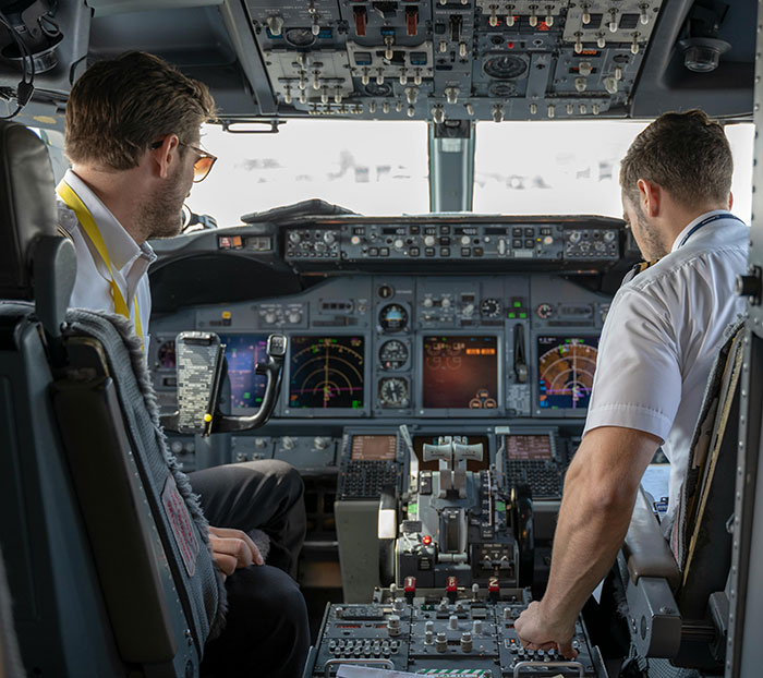 Two pilots inside a cockpit preparing for flight moments before a DC plane crash Army pilot was instructed to move away
