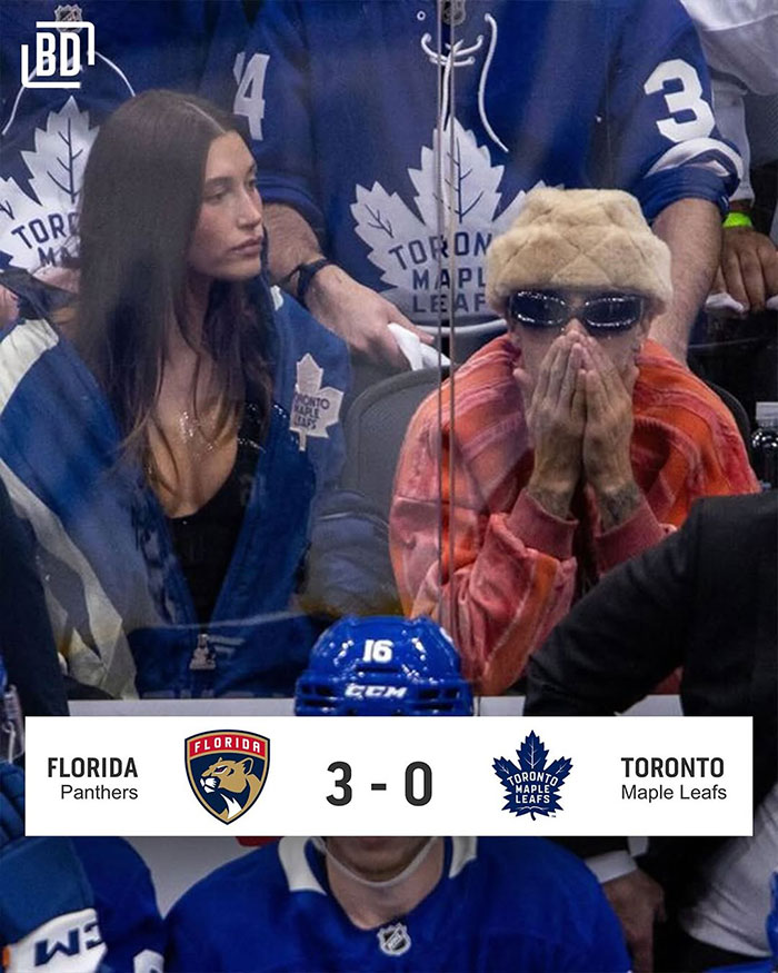 Hailey Bieber sitting courtside at hockey game after Justin Bieber's tantrum, fans wearing Toronto Maple Leafs gear. Hailey Bieber sitting courtside at hockey game after Justin Bieber's tantrum, fans wearing Toronto Maple Leafs gear.