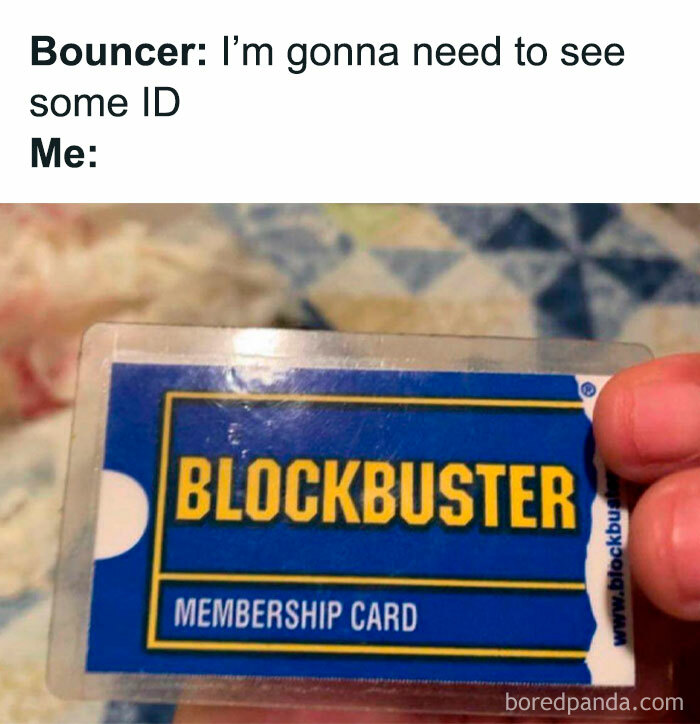 Person holding a vintage Blockbuster membership card, evoking nostalgic memories from past years.