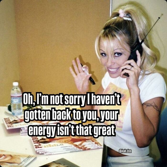 Young woman with a high ponytail talking on the phone, smiling, with a meme text about energy and apologizing.