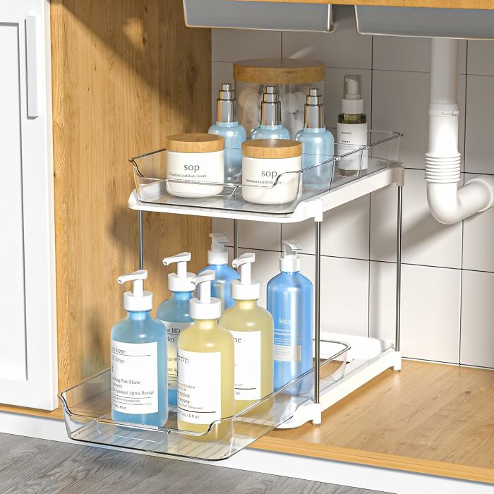Clear organizer under sink holding assorted skincare and body care products, a popular Amazon wishlist favorite item.