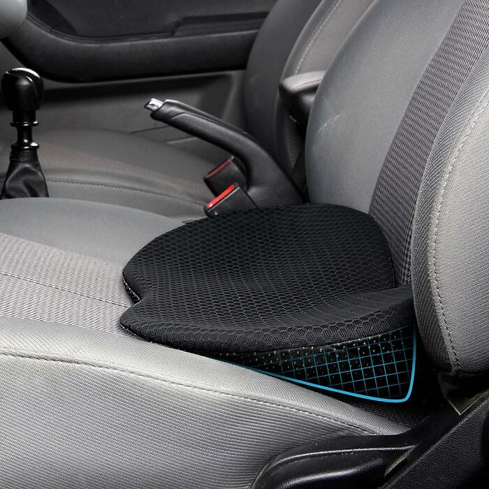 Car seat cushion cushion pad placed on gray fabric car seat, popular Amazon finds on wishlists right now.