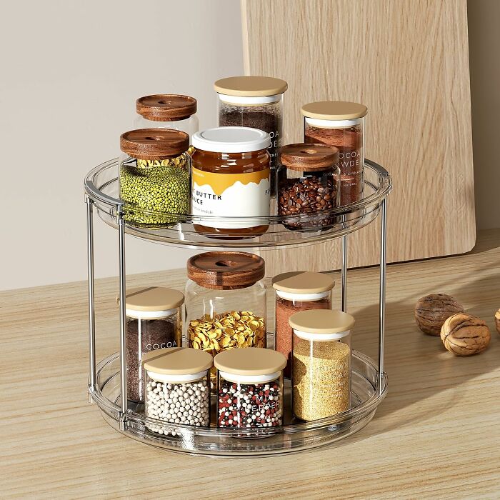 Organized kitchen jars on a rotating rack showcasing storage ideas for a kitchen glow-up without a full renovation.