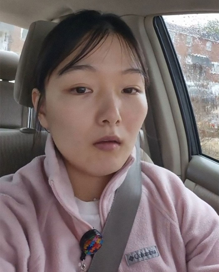 Young woman in a car wearing a pink Columbia jacket, reacting to husband saying wife is delusional and does nothing for his mom. Young woman in a car wearing a pink Columbia jacket, reacting to husband saying wife is delusional and does nothing for his mom.