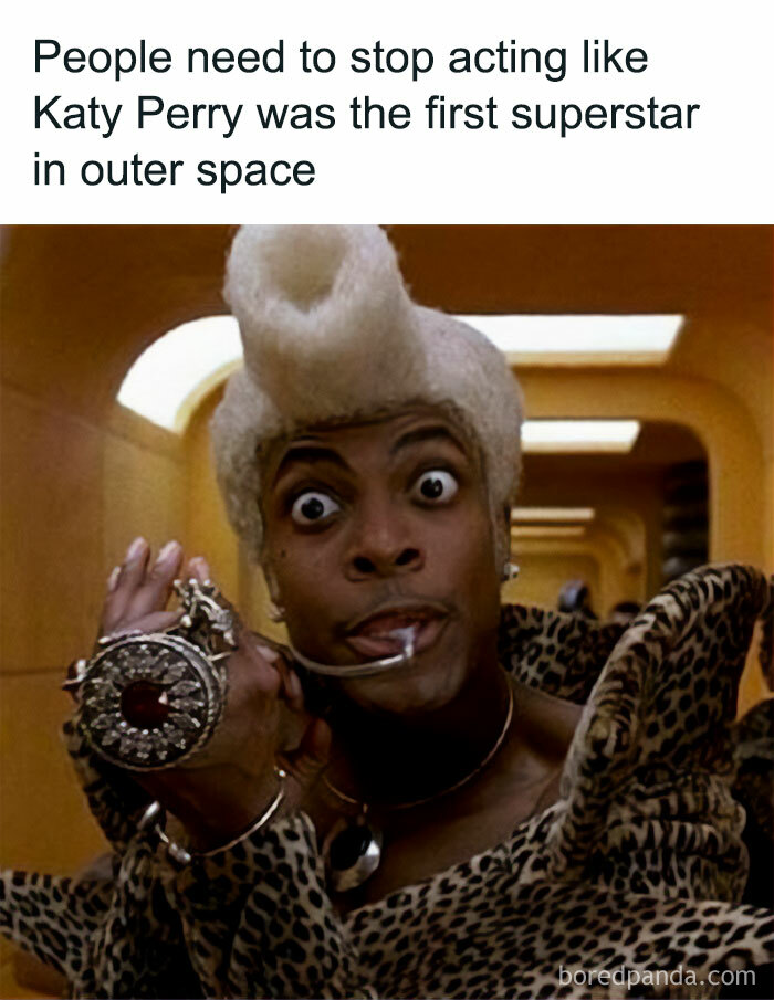 90s nostalgic meme featuring a character with a unique hairstyle and leopard print outfit referencing outer space superstardom.