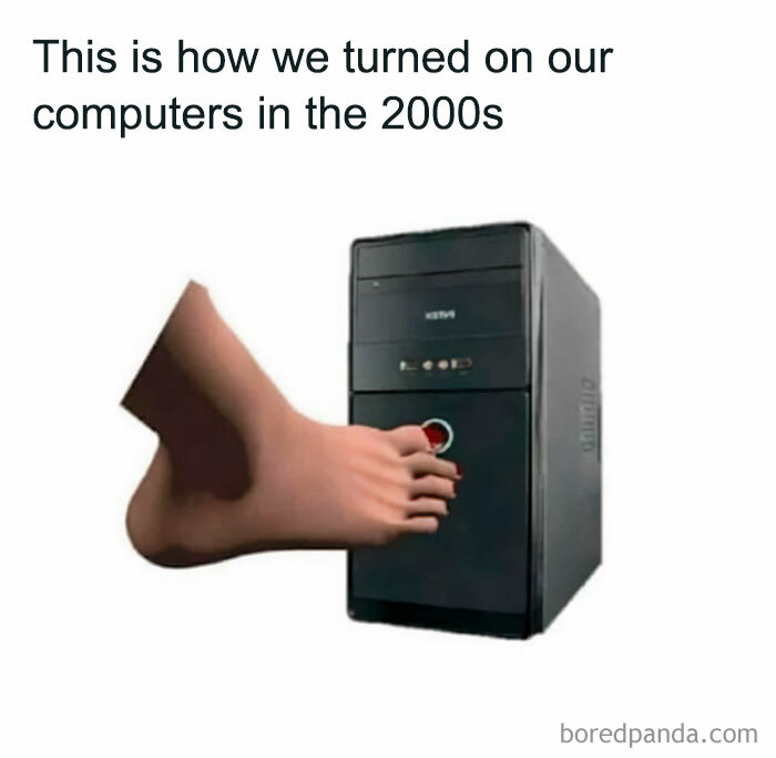Foot pressing power button on old desktop computer, funny nostalgic 90s post about technology from early 2000s.