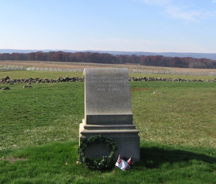 Tombstone monument in a field representing one of the biggest mistakes that changed the course of history.