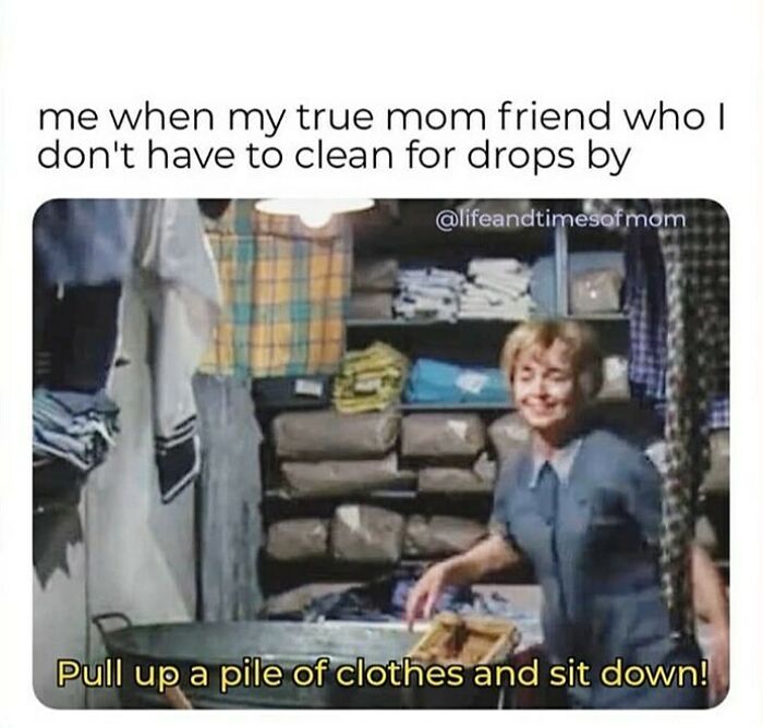 Woman smiling and sitting on a pile of clothes, reflecting funny parenting memes that are painfully relatable from an IG account.