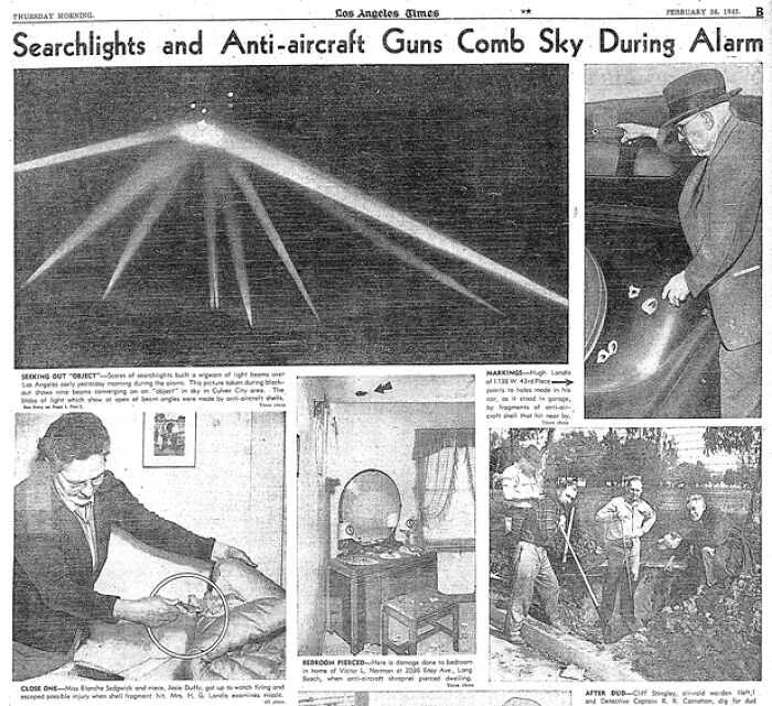 Black and white historical newspaper showing bizarre anti-aircraft searchlights and unusual wartime scenes.