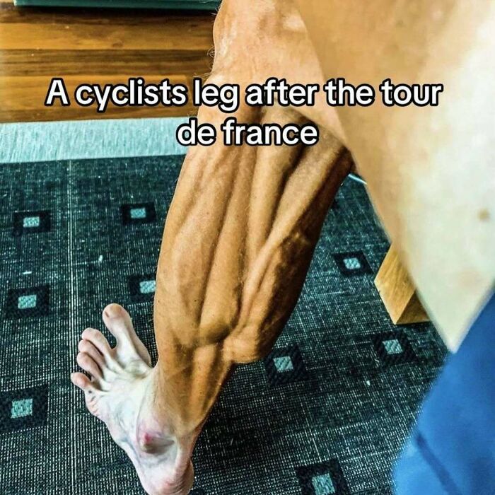 A close-up view of a cyclist’s leg showing muscle definition after the Tour de France race event.