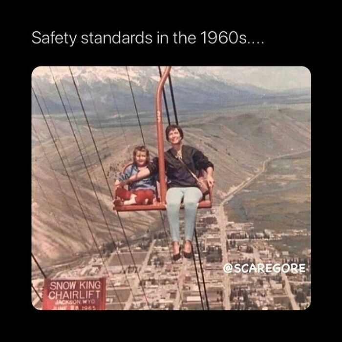 Two people sitting on an open chairlift high above a town in the 1960s, showing disturbing and unsettling events.