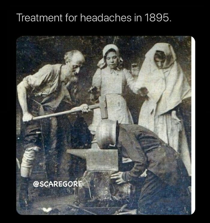 Old black and white photo showing disturbing and unsettling events as a man prepares to hit another man’s head with a hammer.