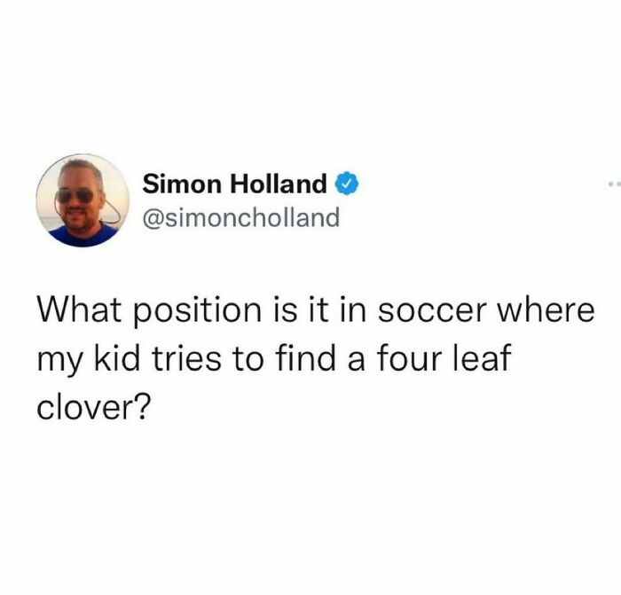 Hilariously random post showing a funny tweet about a kid looking for a four leaf clover during a soccer game.