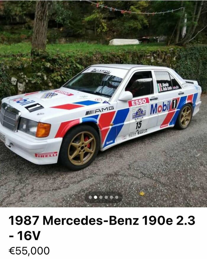 White 1987 Mercedes-Benz 190e 2.3-16V race car with Mobil 1 and AMG decals for sale in outdoor setting.
