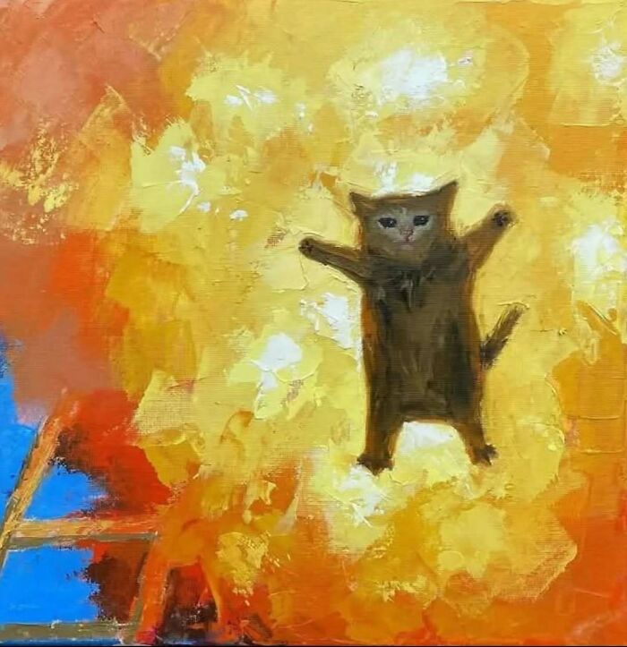 A painted cat mid-air in an explosion with bright orange and yellow flames, perfect for relatable memes content.