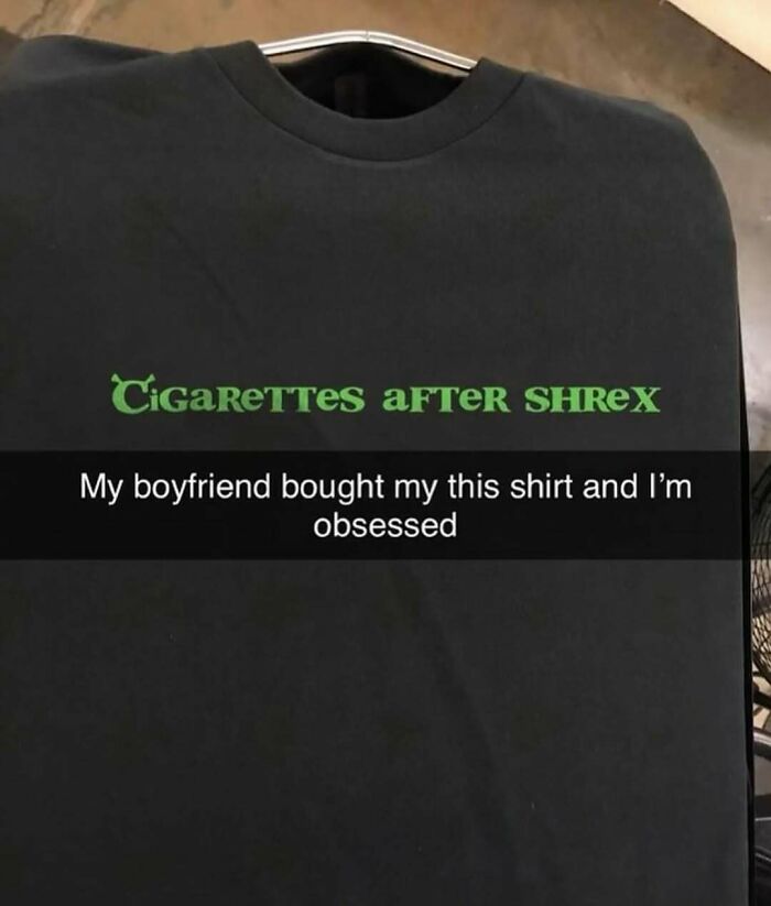Black shirt with green text saying cigarettes after shrex, caption about boyfriend buying it, relatable memes theme.