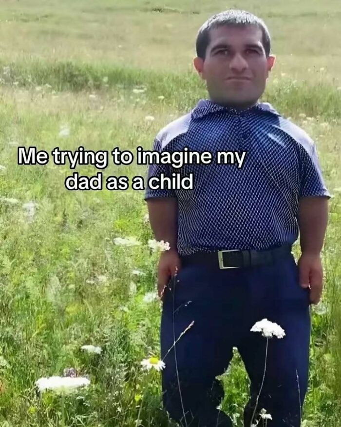Man standing in a grassy field with text about trying to imagine dad as a child, funny relatable meme from Instagram account.