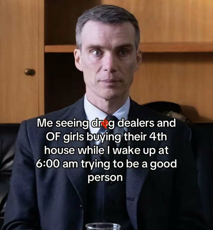 Man in suit with serious expression in a meme about relatable and funny moments from an Instagram memes account.