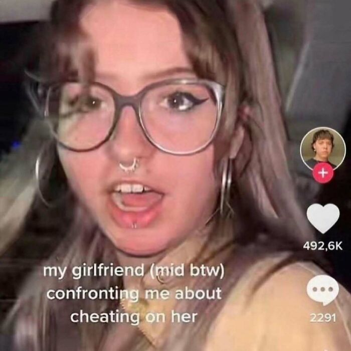 Young woman with glasses and piercings in a cringey Instagram video confronting about cheating.