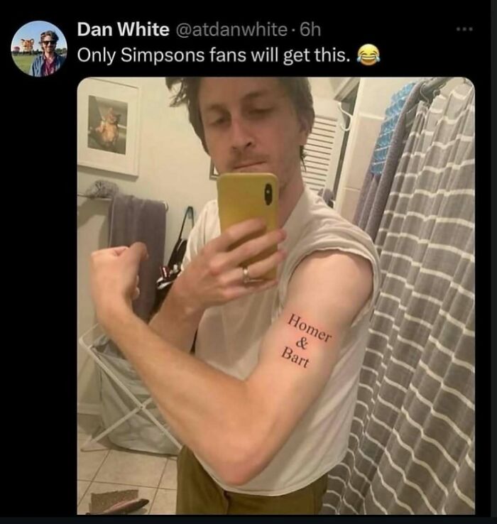 Man taking a mirror selfie showing a tattoo on his arm that says Homer and Bart from cringey Instagram account posts.