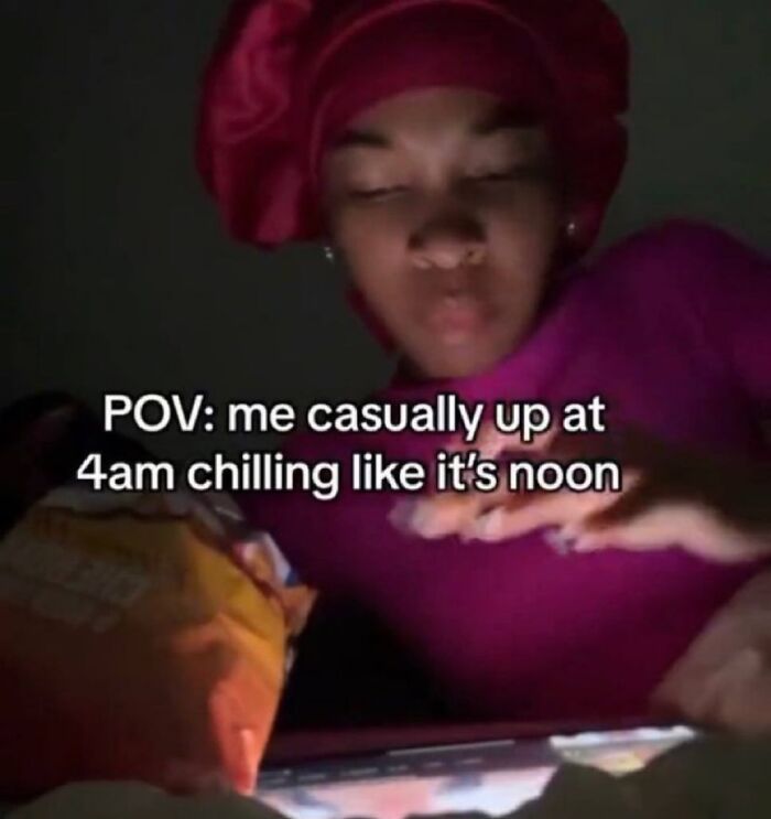 Person in red headwrap and purple shirt casually up at 4am, featured in silly relatable and spicy memes shared on IG page.