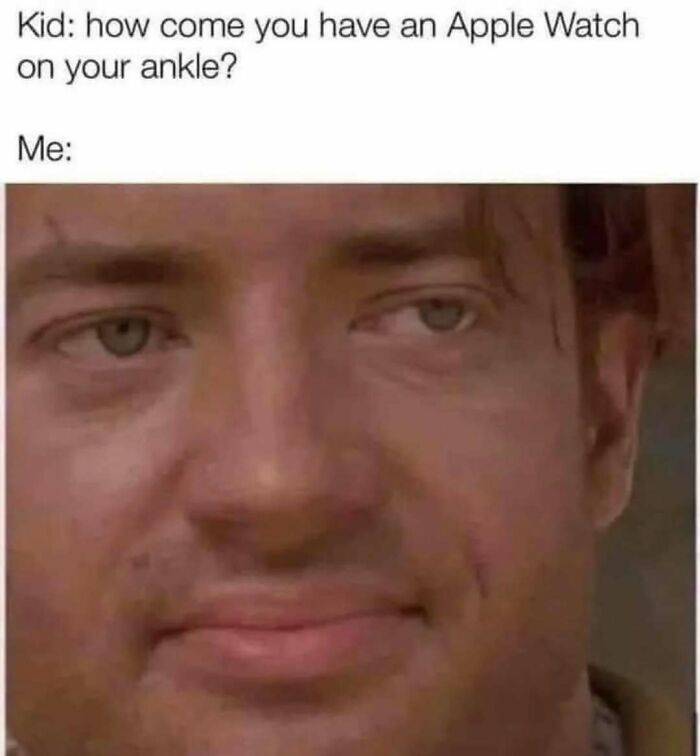 Close-up of a man’s face with a subtle smile, representing nostalgia memes about life in the 80s, 90s, and 00s.