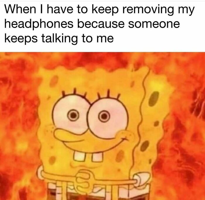 SpongeBob meme about removing headphones while fire burns in the background, highlighting relatable memes for avoiding responsibilities.