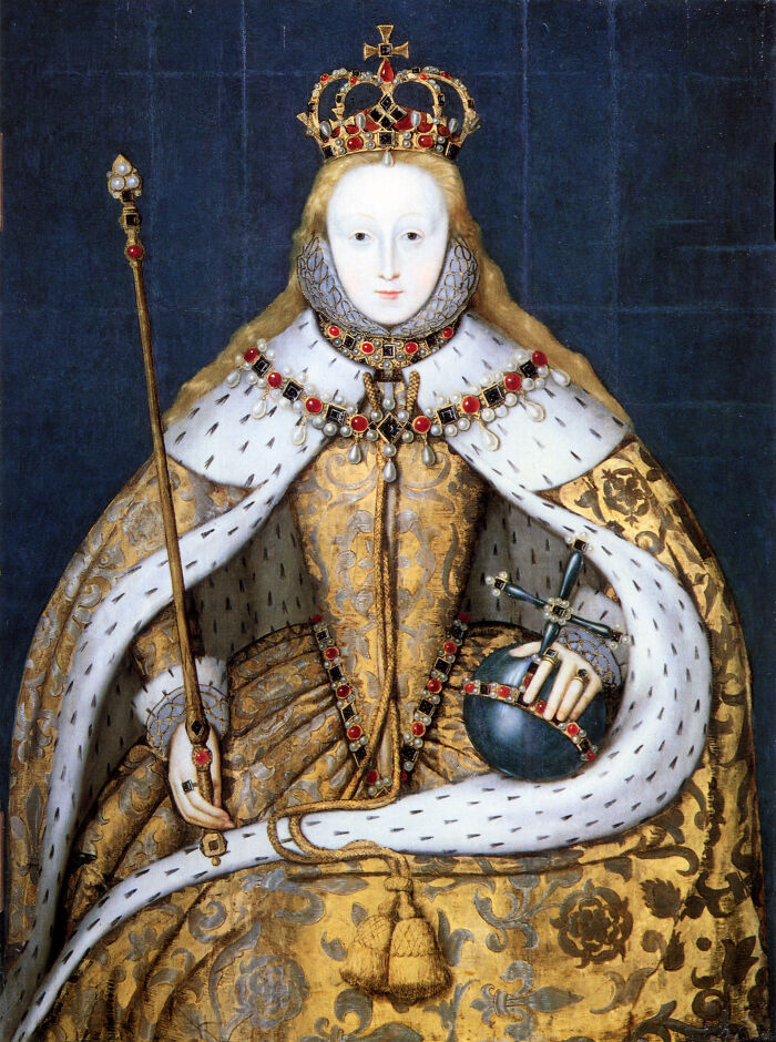 Portrait of a royal figure wearing a jeweled crown and ornate robes, symbolizing royalty in history facts.