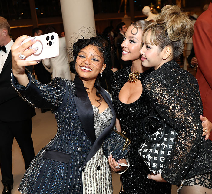 Three celebs taking a selfie at Met Gala, breaking the strict no phones rule to reveal what goes on inside.