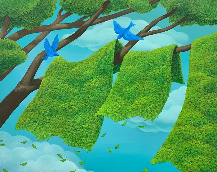 Green leafy fabrics hanging from tree branches with two blue birds flying amid a calming natural scene by Mulgil Kim.