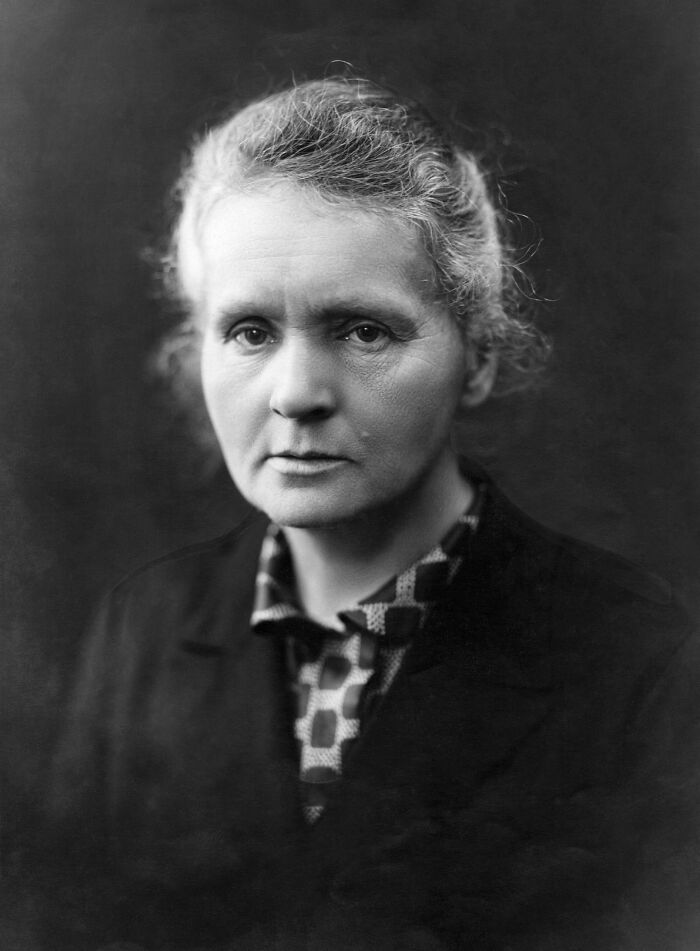 Portrait of Marie Curie in black and white, highlighting the pioneering scientist behind shocking facts and discoveries.