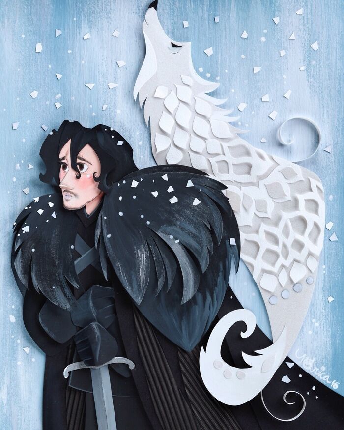 Detailed paper art of a black-cloaked figure with a sword and a white wolf silhouette in the background with falling snow.
