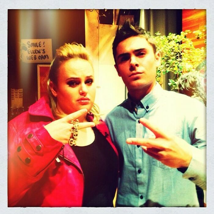 Two celebrities posing with hand gestures in a vintage Instagram post shared way back in the day.