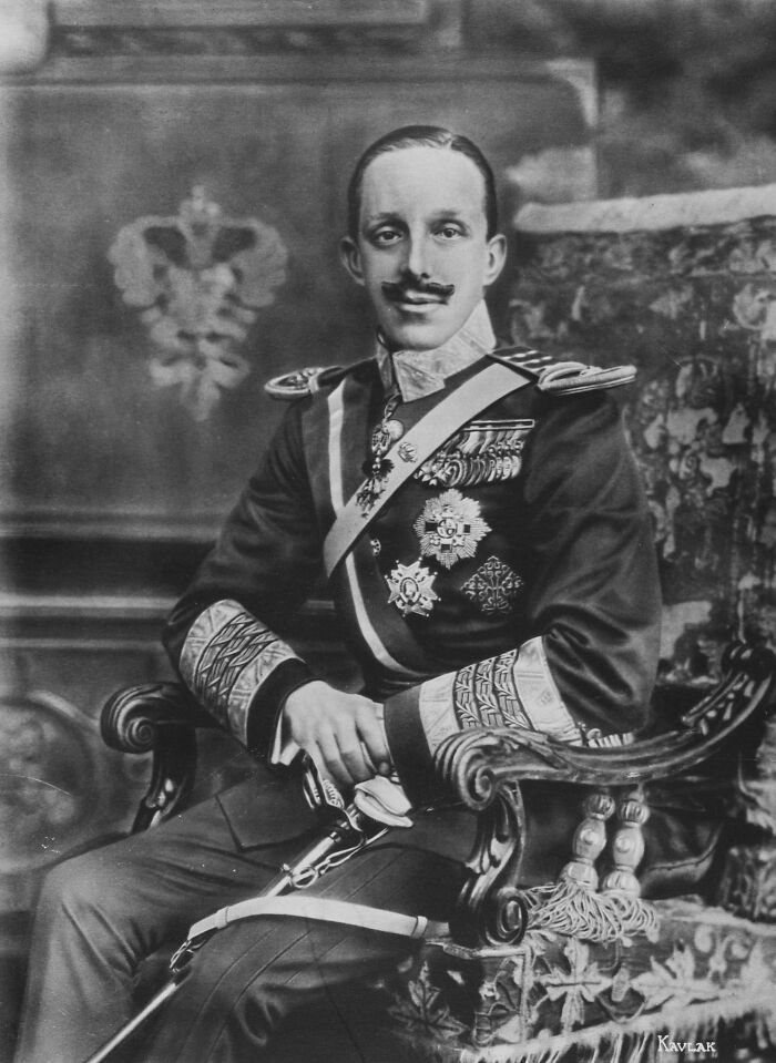 Black and white portrait of a royal figure in ornate uniform showcasing surprising facts about royals history.