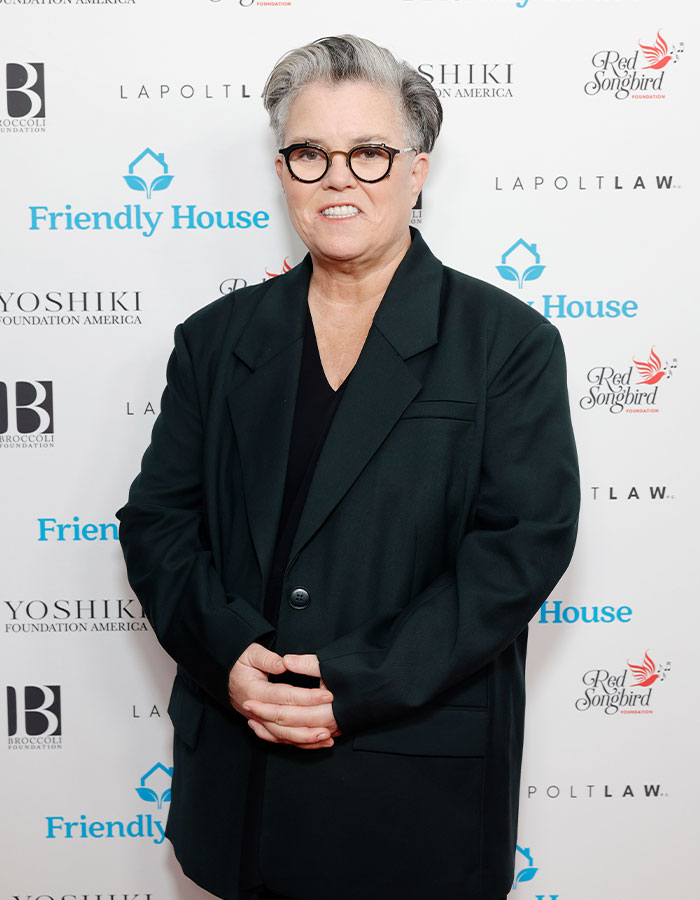 Rosie O&rsquo;Donnell at an event wearing glasses and a black blazer showcasing dramatic Mounjaro weight loss transformation.