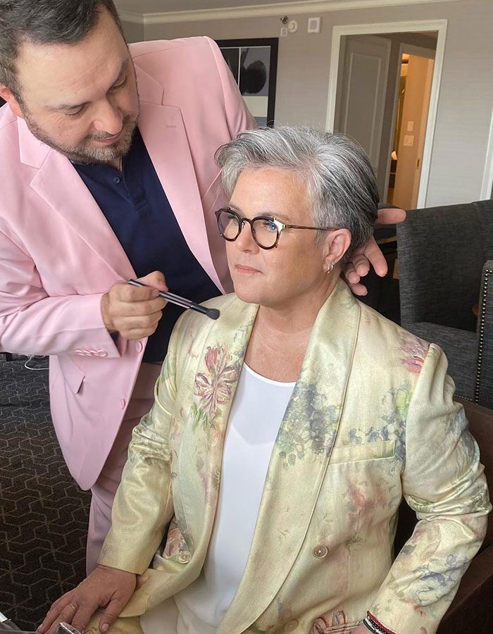 Rosie O&rsquo;Donnell getting makeup applied, showcasing dramatic Mounjaro weight loss transformation indoors.