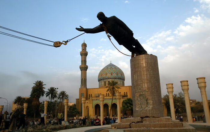 Statue being toppled in a public square, representing one of the biggest mistakes that changed the course of history.
