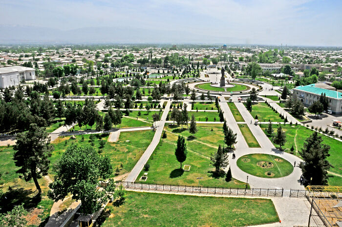 Aerial view of a large green park with pathways and trees, one of the stunning UNESCO treasures worldwide.