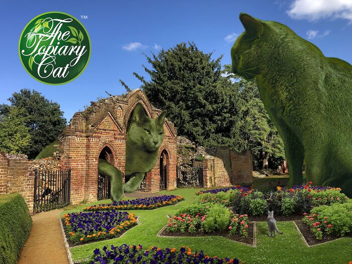 Green cat shaped as a bush in a garden with flowers and old brick building, showcasing creative cat bush edits.