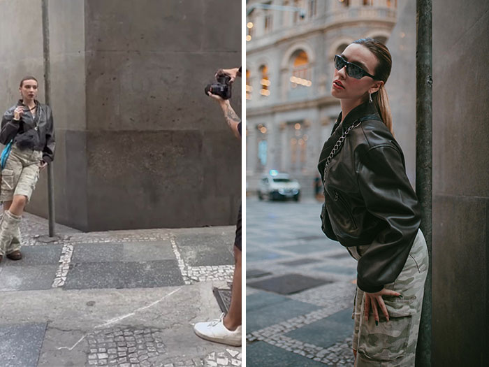 Photographer capturing behind the scenes of a street photoshoot with a model posing against an urban backdrop.