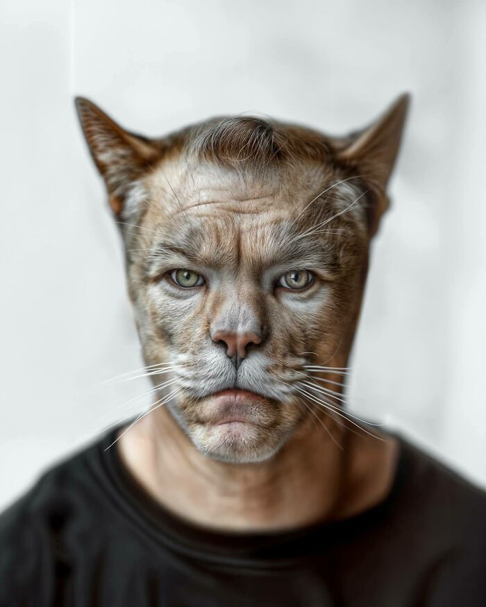 Human-animal blend portrait showing a cat-faced person wearing a black shirt, exploring identity and imagination.