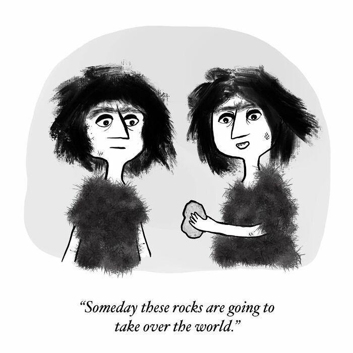 One-panel comic by Dahlia Gallin Ramirez showing two cave people with a rock discussing the future takeover of rocks.