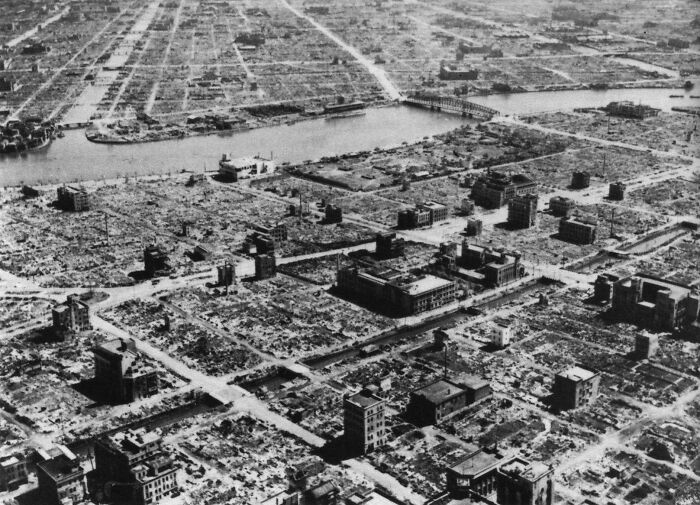 Aerial view of a city devastated by a massive disaster, illustrating one of the biggest mistakes that changed history.