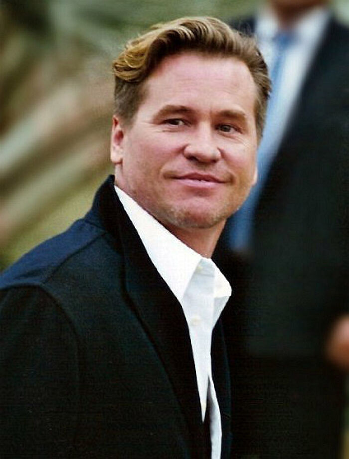 Middle-aged man with light brown hair wearing a white shirt and black jacket, representing notable people who passed away in 2025.