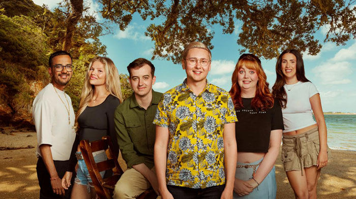 Group of 12 singles on a tropical beach filming new reality show Virgin Island performing raunchy challenges to lose virginity Group of 12 singles on a tropical beach filming new reality show Virgin Island performing raunchy challenges to lose virginity