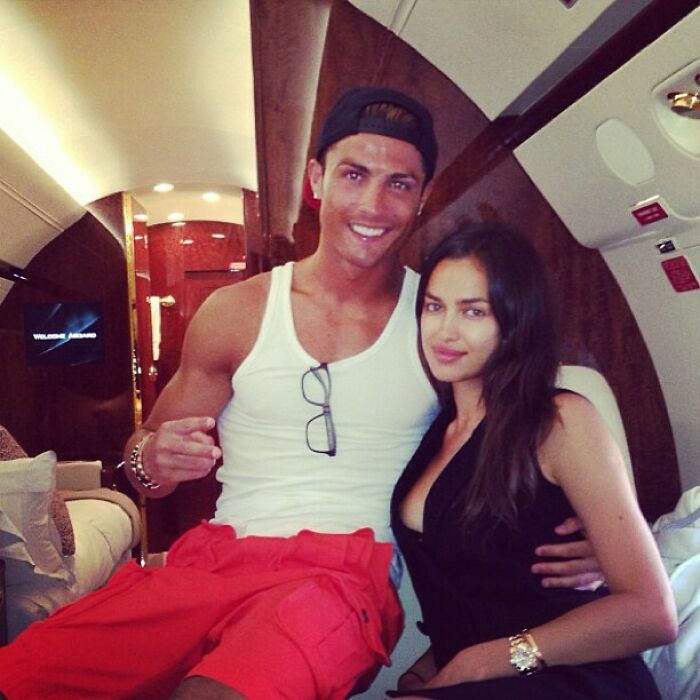 Cristiano Ronaldo and a woman posing inside a private jet in a casual Instagram post from way back in the day.