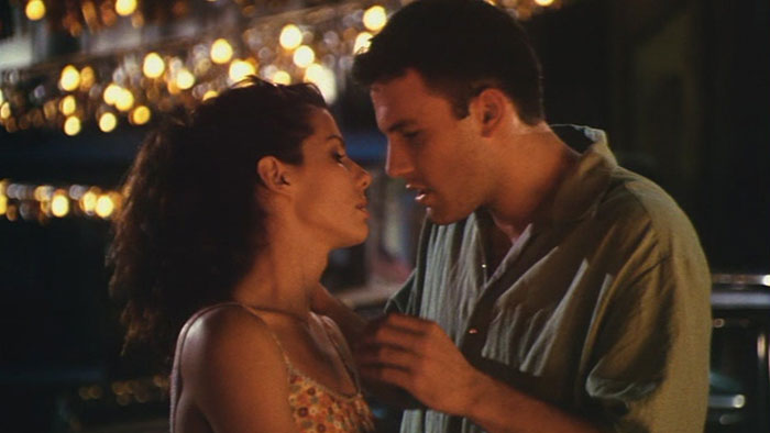 Two celebrities in a romantic moment at night, highlighting themes of hygiene habits and celebrity controversies.